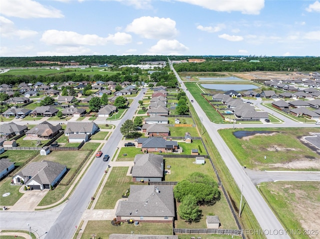 aerial view with a residential view and a water view