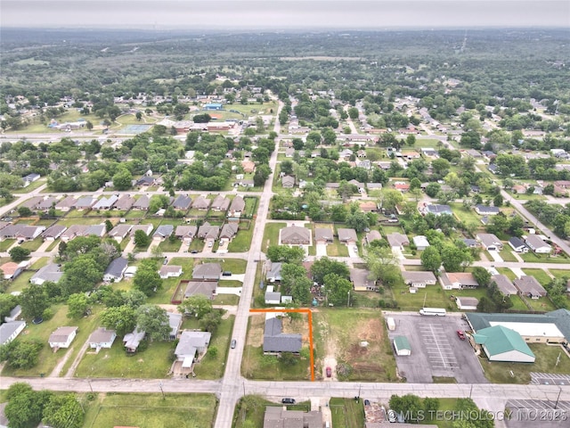 543 N Ridgeway St, Sapulpa, OK 74066 - aerial view of property and surrounding area featuring property boundaries highlighted and nearby suburban area
