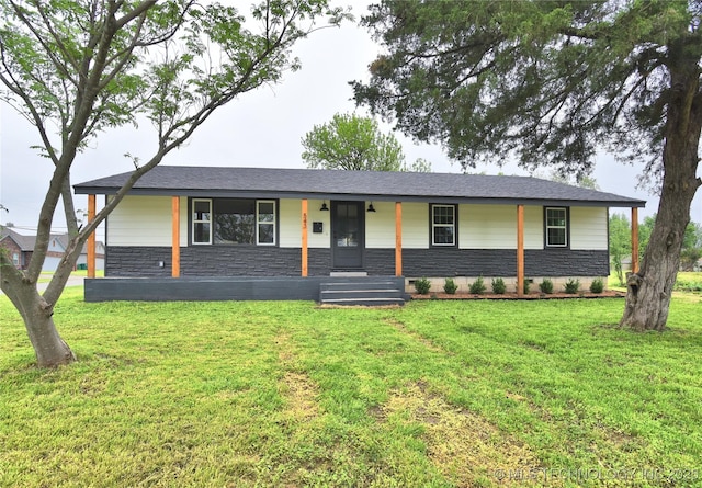 543 N Ridgeway St, Sapulpa, OK 74066 - ranch-style home with stone siding, a porch, and a front lawn