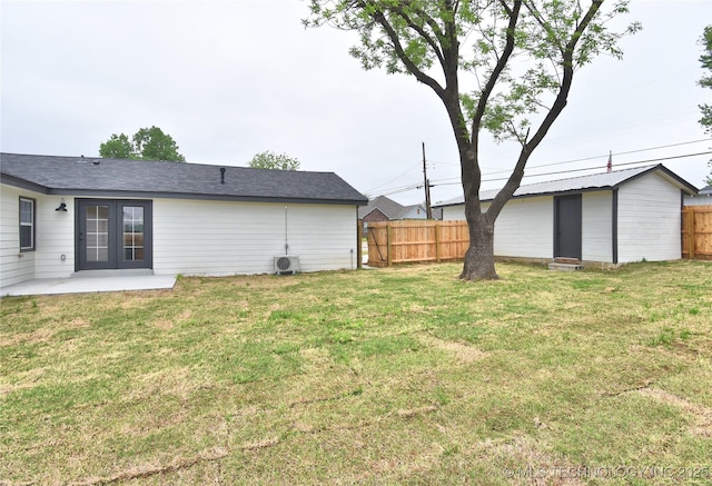543 N Ridgeway St, Sapulpa, OK 74066 - view of yard with a patio area, ac unit, an outbuilding, and french doors