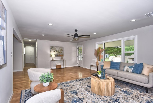543 N Ridgeway St, Sapulpa, OK 74066 - living room with baseboards, wood finished floors, recessed lighting, and a ceiling fan