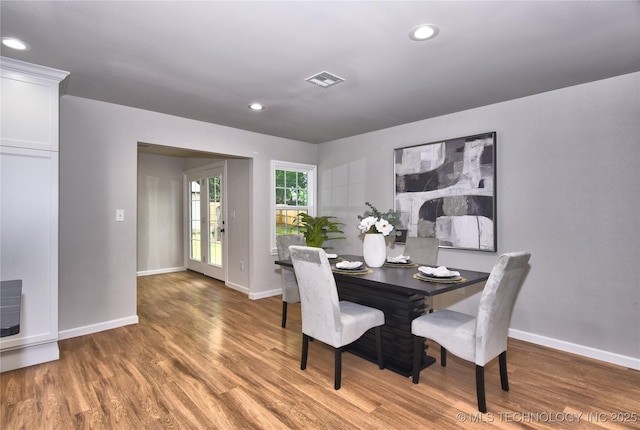 543 N Ridgeway St, Sapulpa, OK 74066 - dining room with wood finished floors, baseboards, and recessed lighting