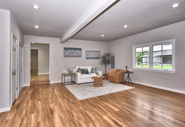 543 N Ridgeway St, Sapulpa, OK 74066 - living area with wood finished floors, baseboards, recessed lighting, beam ceiling, and electric panel