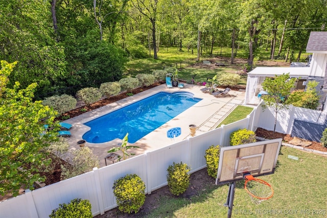 view of pool featuring a lawn, a fenced backyard, a fenced in pool, and a patio area