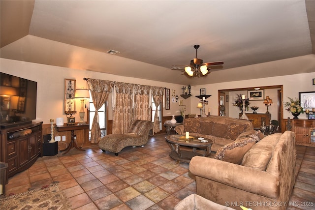 3001 Bacon Rd, Muskogee, OK 74403 - living room featuring visible vents, stone finish flooring, and ceiling fan