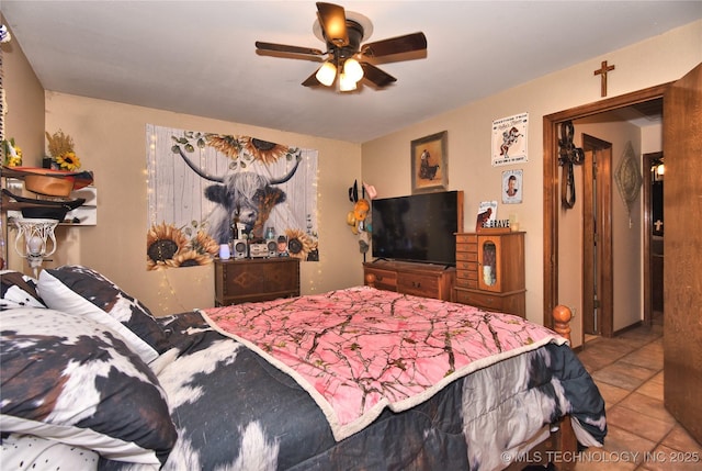 3001 Bacon Rd, Muskogee, OK 74403 - tiled bedroom featuring a ceiling fan