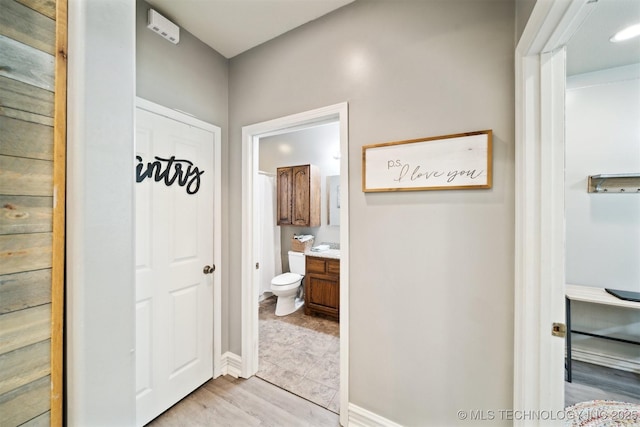 539 N Gunter St, Vinita, OK 74301 - corridor featuring light wood-style flooring