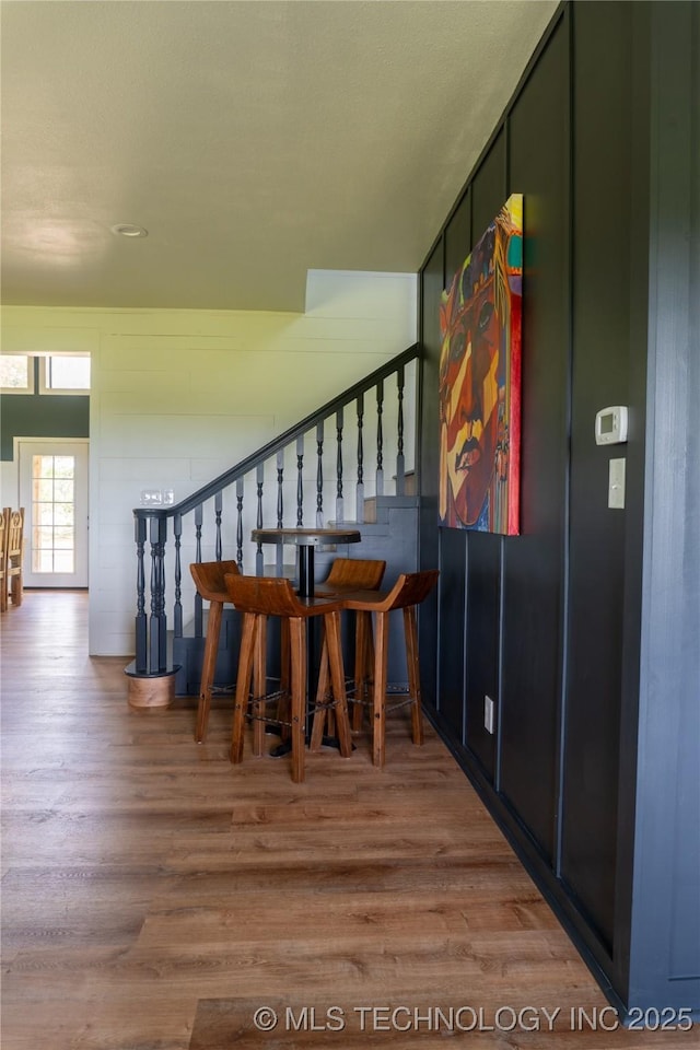 hall with stairway and wood finished floors