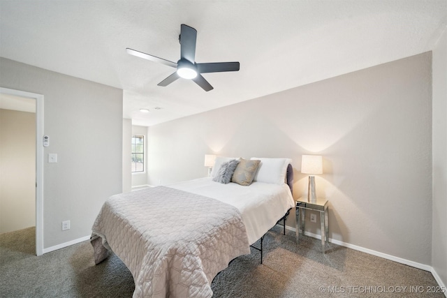 bedroom featuring carpet, a ceiling fan, and baseboards