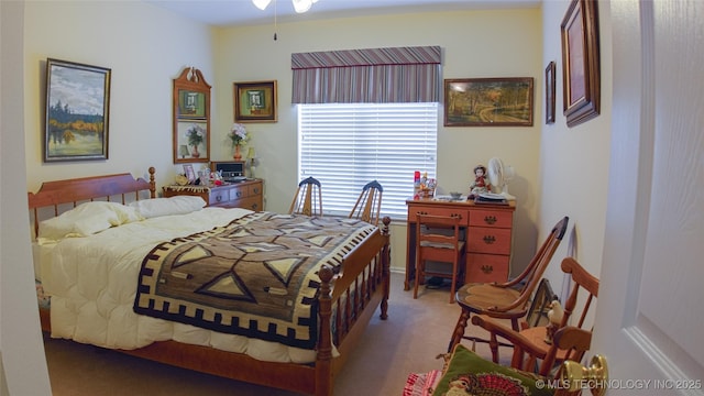 bedroom featuring carpet
