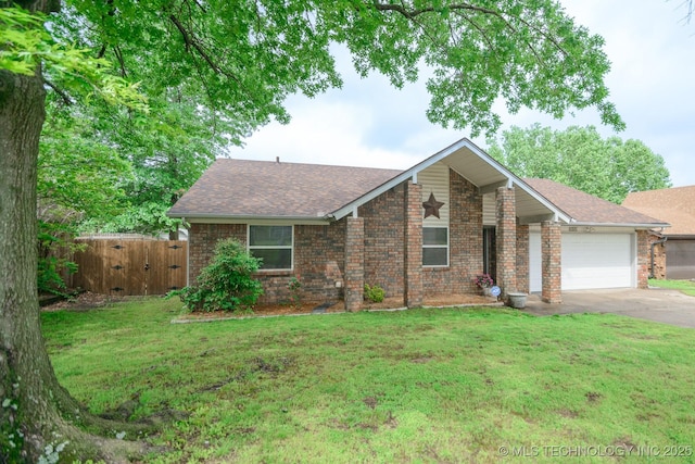 ranch-style home featuring brick siding, a front lawn, driveway, and an attached garage