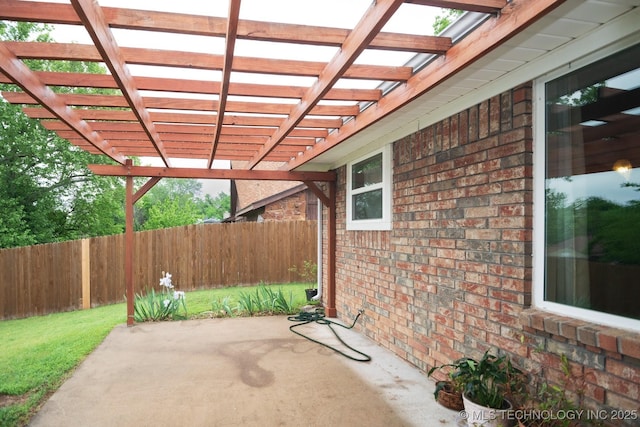 view of patio / terrace with fence and a pergola