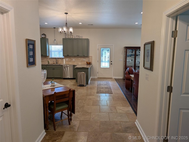 277 Oak Hollow Rd, Eufaula, OK 74432 - kitchen with dishwasher, stone tile floors, decorative backsplash, plenty of natural light, and recessed lighting