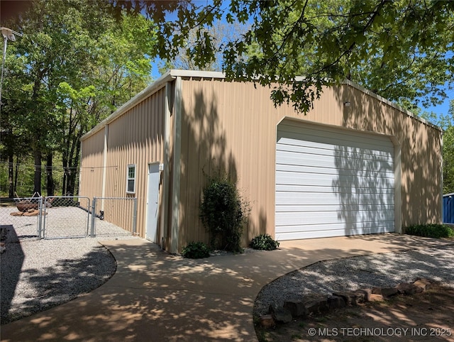 277 Oak Hollow Rd, Eufaula, OK 74432 - detached garage with fence, a gate, and driveway