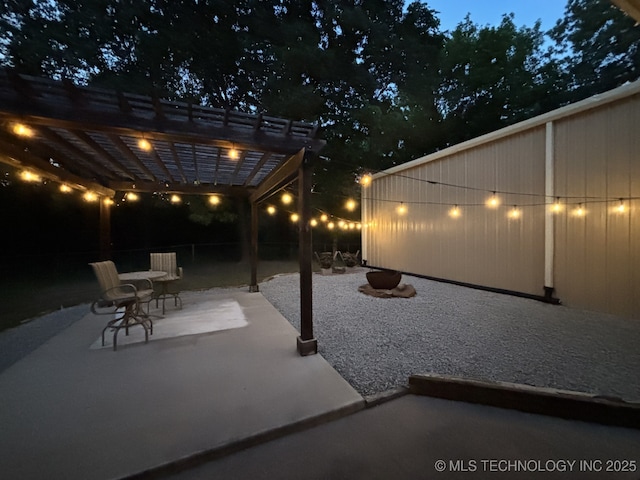 277 Oak Hollow Rd, Eufaula, OK 74432 - patio at twilight with a pergola and fence