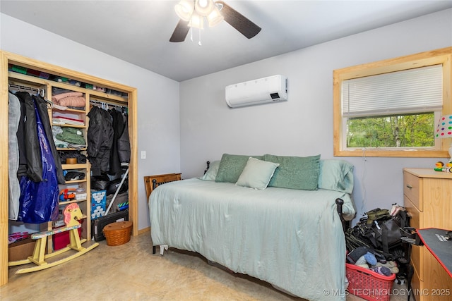 65365 E 155th Rd, Wyandotte, OK 74370 - carpeted bedroom with ceiling fan, a wall unit AC, and a closet