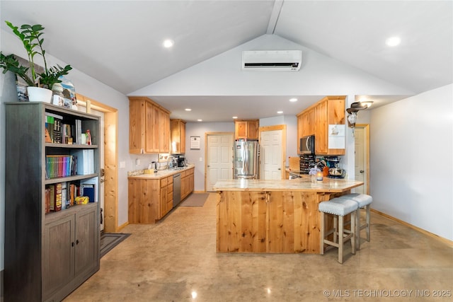 65365 E 155th Rd, Wyandotte, OK 74370 - kitchen featuring lofted ceiling, a wall unit AC, a sink, appliances with stainless steel finishes, and a peninsula