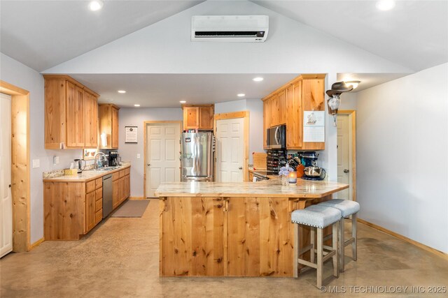 65365 E 155th Rd, Wyandotte, OK 74370 - kitchen with recessed lighting, stainless steel appliances, a sink, a wall unit AC, and a peninsula