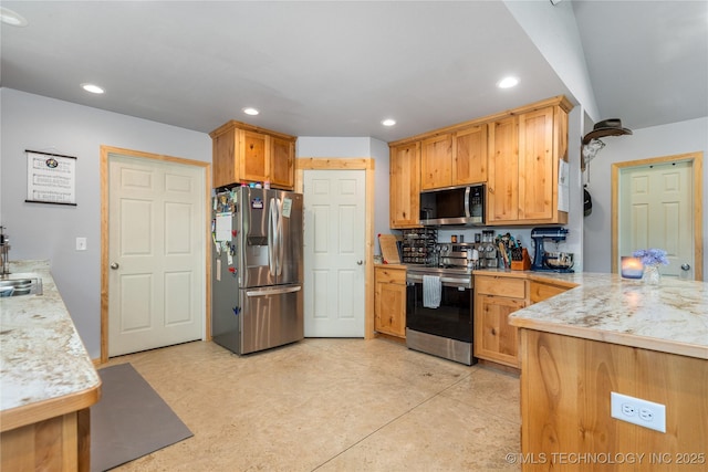 65365 E 155th Rd, Wyandotte, OK 74370 - kitchen featuring stainless steel appliances, light countertops, recessed lighting, and a sink