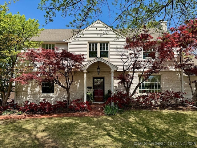 2849 E 26th Pl, Tulsa, OK 74114 - traditional-style home with a front yard