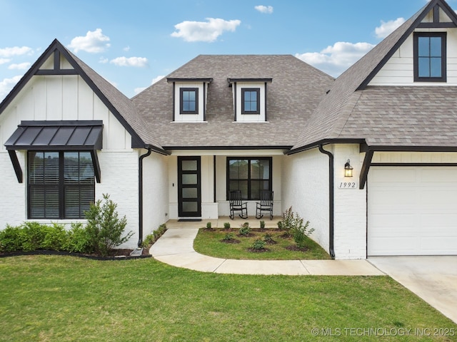 1992 E 173rd St S, Mounds, OK 74047 - modern farmhouse style home with covered porch, brick siding, an attached garage, and roof with shingles