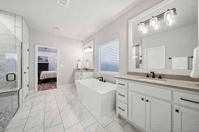 1992 E 173rd St S, Mounds, OK 74047 - ensuite bathroom with a freestanding bath, visible vents, a stall shower, and marble finish floor