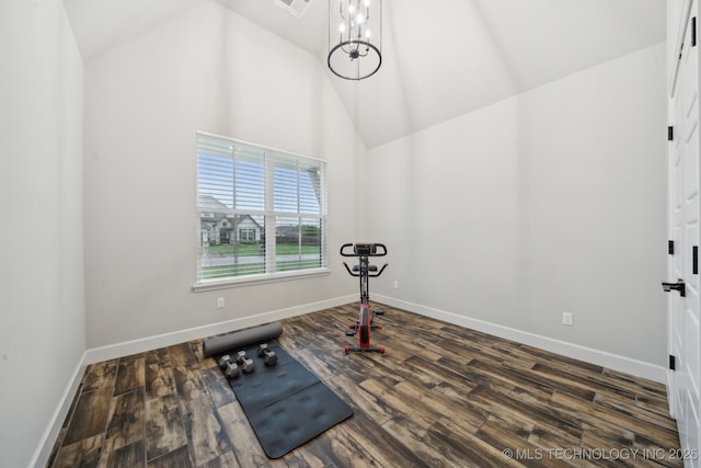 1992 E 173rd St S, Mounds, OK 74047 - exercise area with high vaulted ceiling, baseboards, and dark wood-type flooring