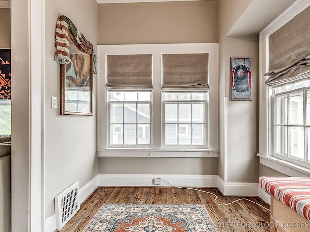 1805 W Easton St, Tulsa, OK 74127 - living area featuring wood finished floors and healthy amount of natural light