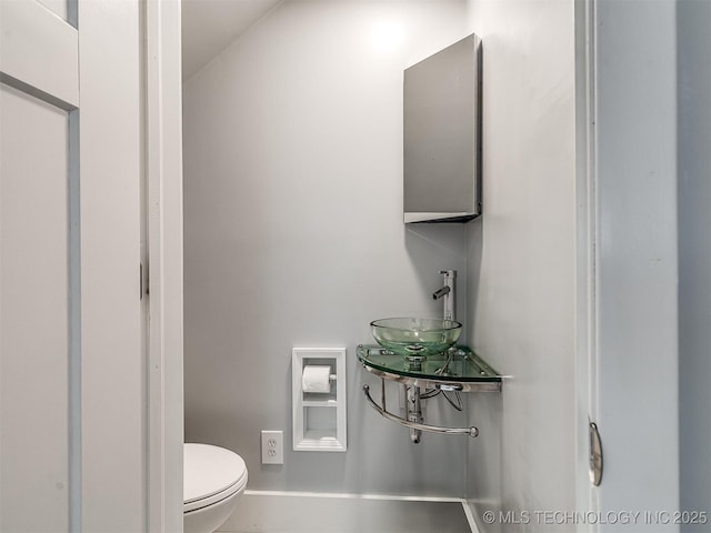 1805 W Easton St, Tulsa, OK 74127 - bathroom featuring toilet and a sink