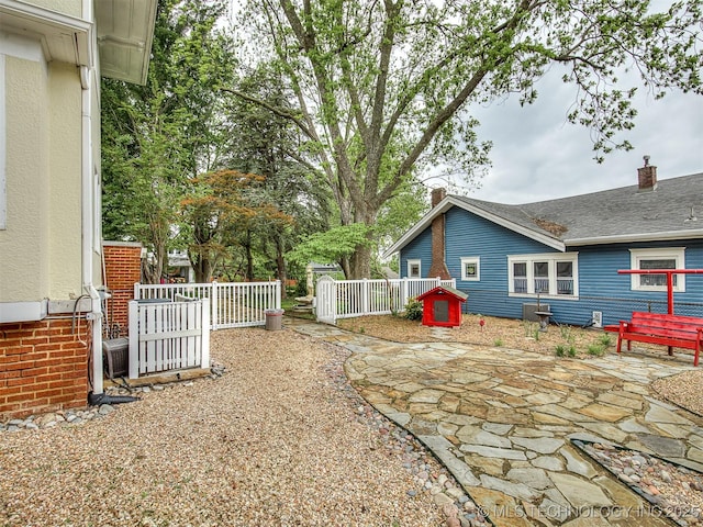 1805 W Easton St, Tulsa, OK 74127 - view of yard featuring a patio area