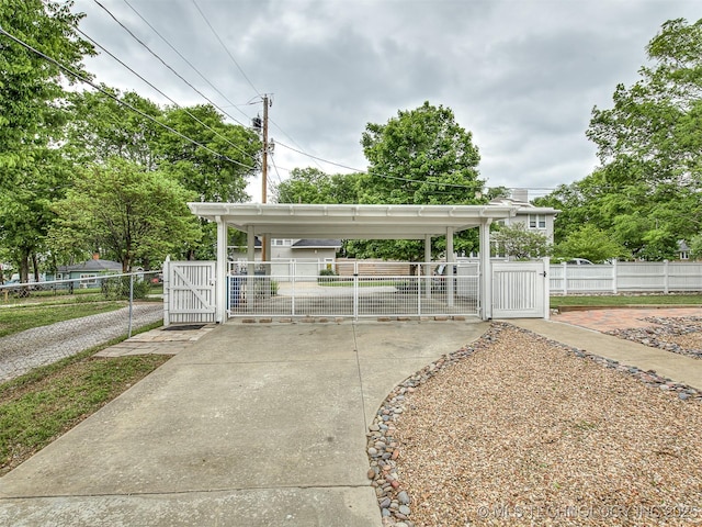 1805 W Easton St, Tulsa, OK 74127 - view of parking featuring a gate and a fenced front yard