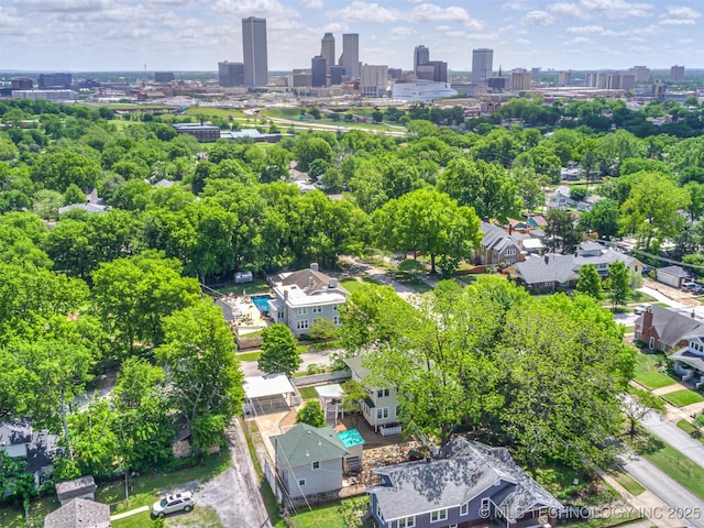 1805 W Easton St, Tulsa, OK 74127 - drone / aerial view of city skyline and a tree filled landscape