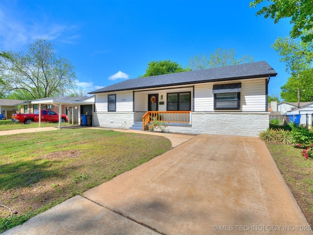ranch-style house with a porch and a front lawn