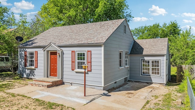 view of outbuilding featuring fence