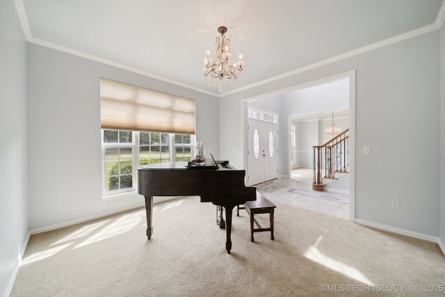 sitting room featuring carpet flooring, a notable chandelier, ornamental molding, and baseboards