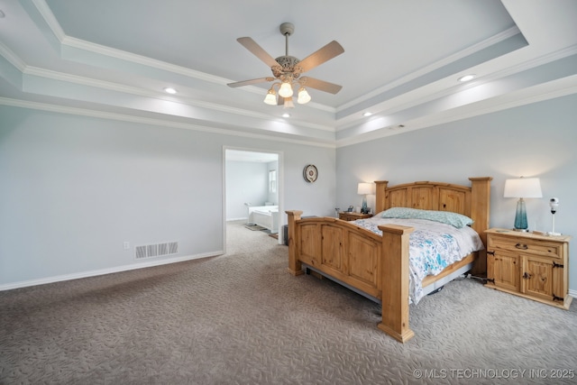bedroom featuring recessed lighting, light carpet, visible vents, crown molding, and a tray ceiling