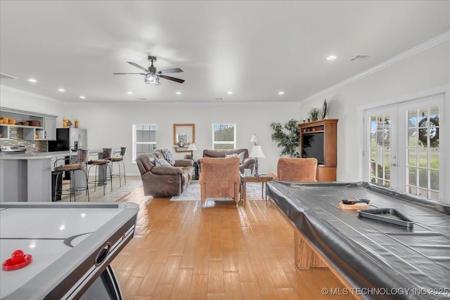 recreation room featuring a ceiling fan, visible vents, billiards, and light wood-type flooring