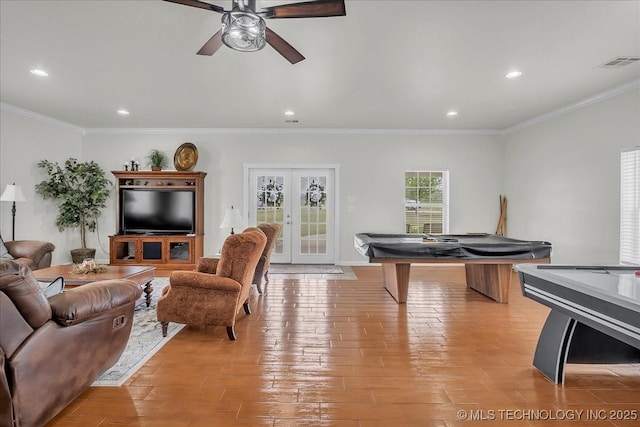 living area with french doors, light wood-style flooring, a ceiling fan, recessed lighting, and visible vents
