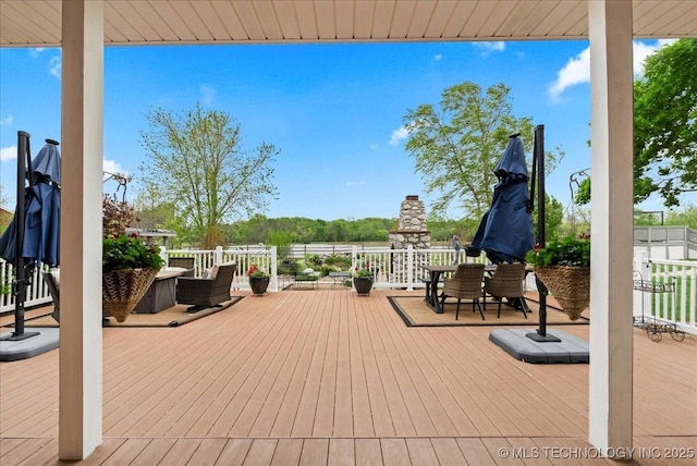 deck featuring outdoor dining area