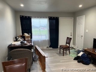 interior space with recessed lighting and wood finished floors