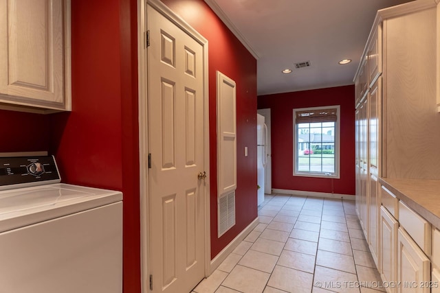 3505 S Birmingham Ave, Tulsa, OK 74105 - laundry area featuring washer / clothes dryer, cabinet space, light tile patterned floors, recessed lighting, and ornamental molding