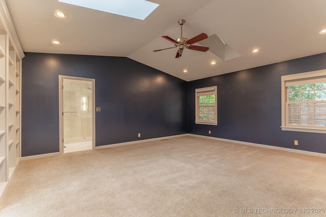 3505 S Birmingham Ave, Tulsa, OK 74105 - carpeted spare room with a skylight, a ceiling fan, lofted ceiling, healthy amount of natural light, and recessed lighting