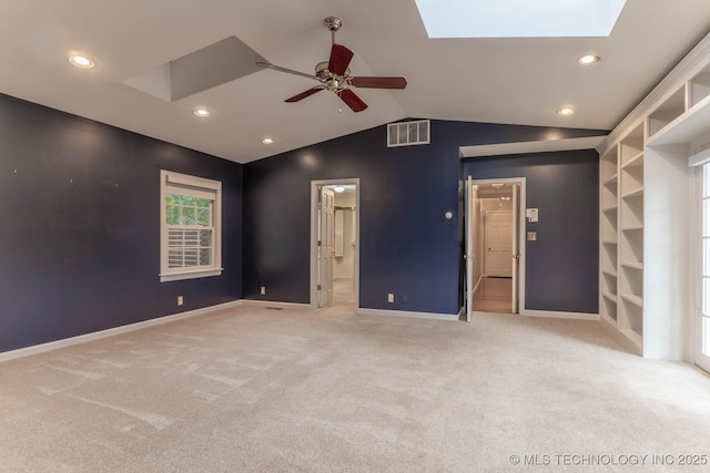 3505 S Birmingham Ave, Tulsa, OK 74105 - unfurnished bedroom with a skylight, carpet, vaulted ceiling, recessed lighting, and ceiling fan