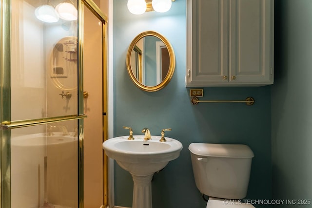 3505 S Birmingham Ave, Tulsa, OK 74105 - bathroom featuring a stall shower and toilet