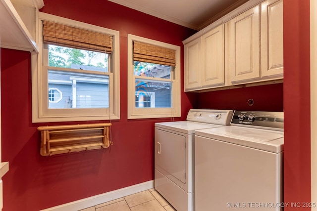 3505 S Birmingham Ave, Tulsa, OK 74105 - washroom with cabinet space, separate washer and dryer, light tile patterned floors, and ornamental molding