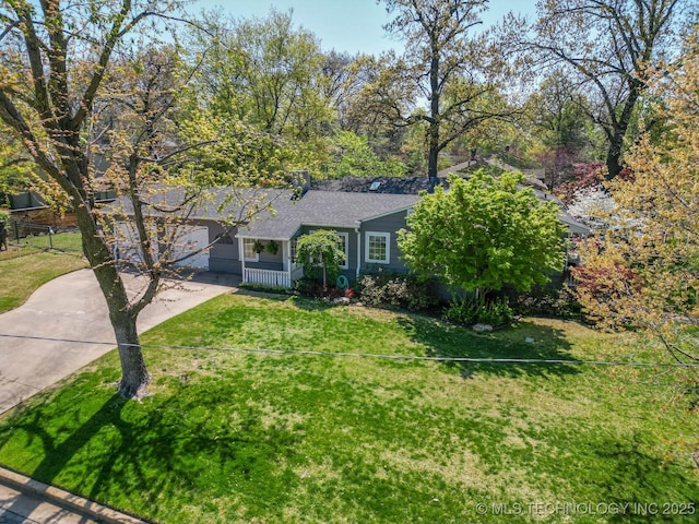 3505 S Birmingham Ave, Tulsa, OK 74105 - ranch-style home featuring concrete driveway, a front lawn, and a shingled roof