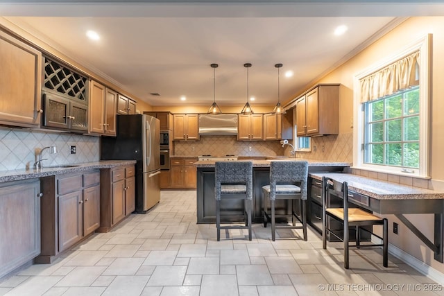 3505 S Birmingham Ave, Tulsa, OK 74105 - kitchen with appliances with stainless steel finishes, wall chimney exhaust hood, light stone counters, tasteful backsplash, and ornamental molding