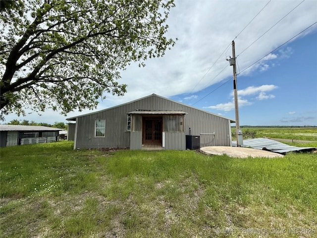 view of outbuilding with central AC
