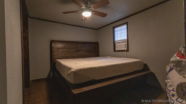 bedroom featuring baseboards, cooling unit, ornamental molding, and ceiling fan