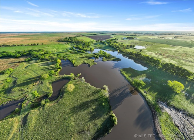 drone / aerial view with a rural view and a water view